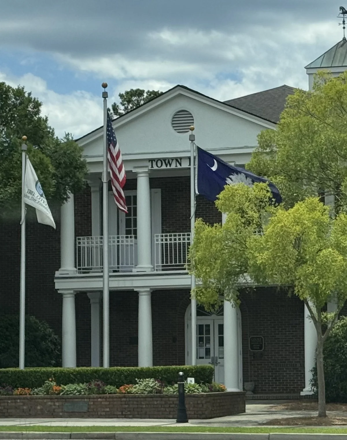 Summerville Town Hall with the American and South Carolina flags, Summerville, South Carolina